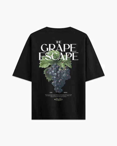 Flat lay black graphic tee back view with 'The Grape Escape' print — raw sample input for MODA AI