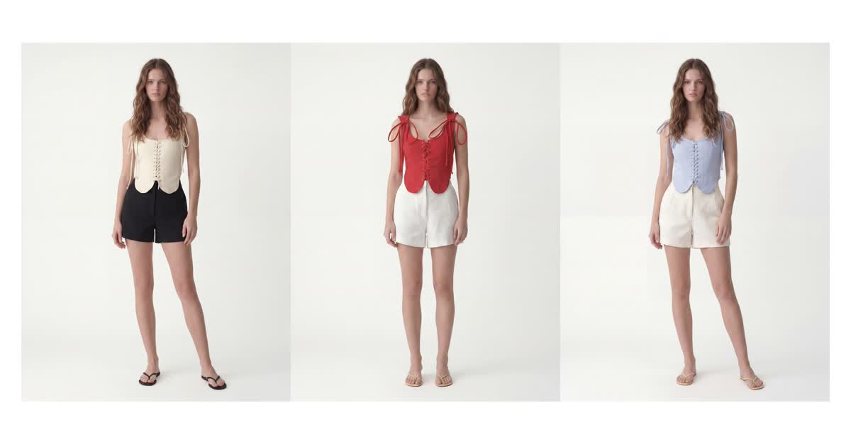 One lace-up vest top in six colorways, each on the same model and clean studio background, generated by MODA AI for a wholesale line sheet