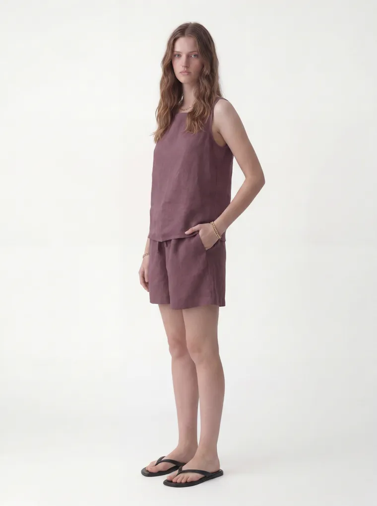 MODA AI catalog output — the linen set in plum, three-quarter angle