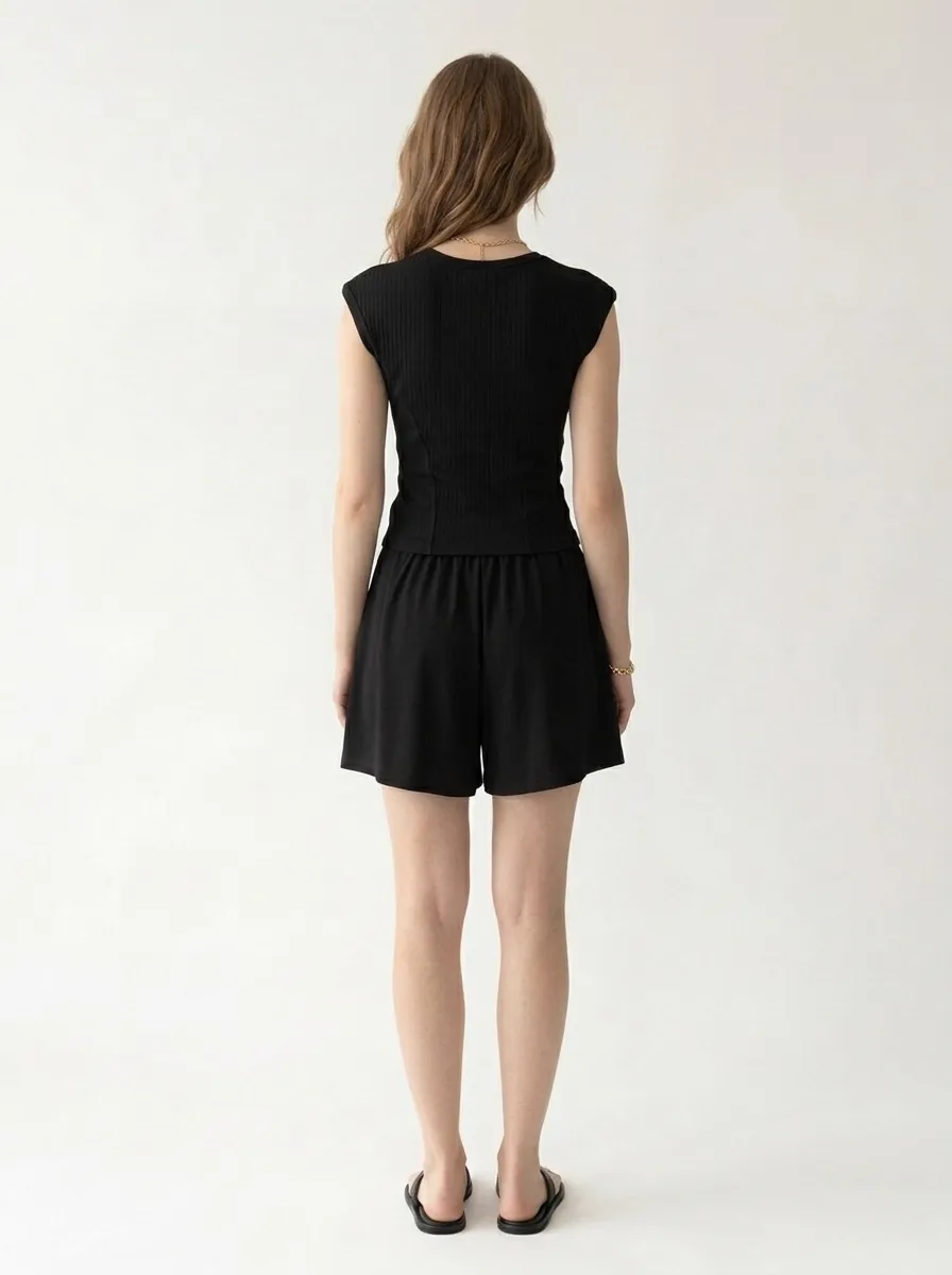 AI-generated model wearing Black comfortwear — pose 3