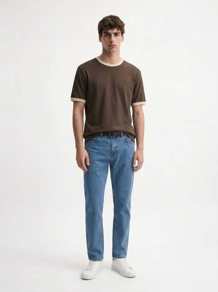 MODA AI on-model output — the brown ringer tee tucked into belted jeans, front, belt at the waist