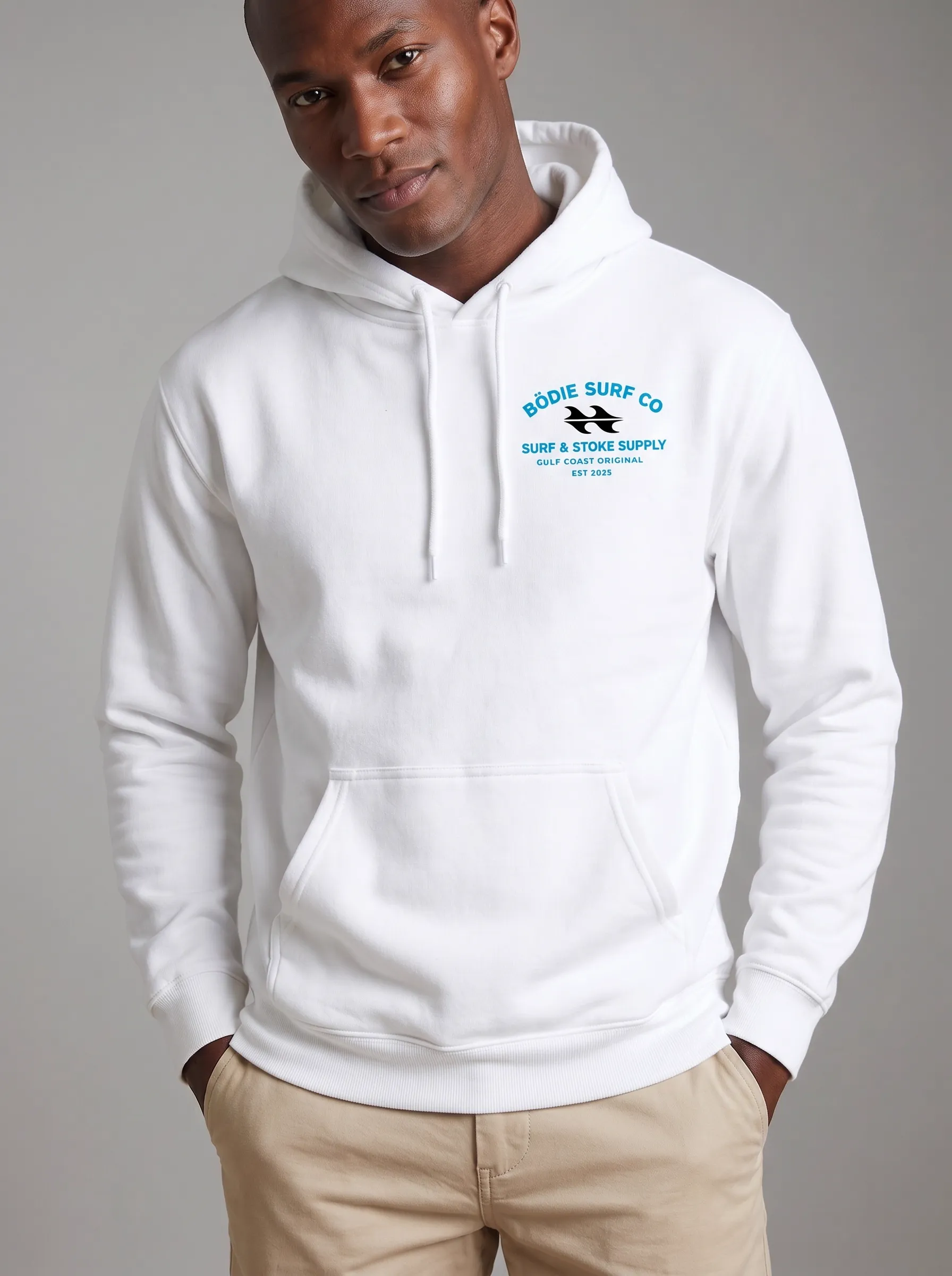 MODA AI output 10 — Black male model in white Bödie Surf Co hoodie, chest logo legible, demonstrating logo reproduction and skin tone realism