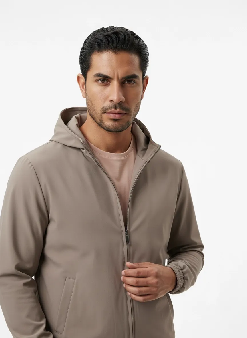 AI-generated — male model wearing beige windbreaker, close-up showing fabric and zipper detail