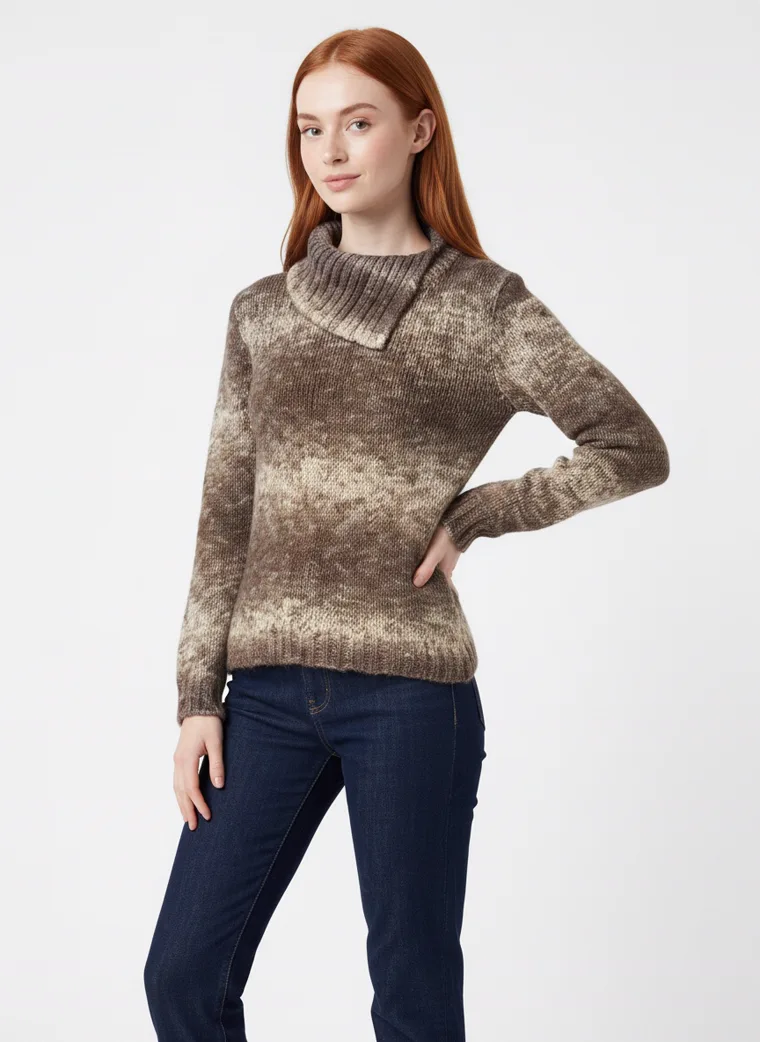 A model in a space-dyed brown and cream marled funnel-neck knit, waist-up in three-quarter, the colour drift in the yarn and the ribbed neck clearly visible