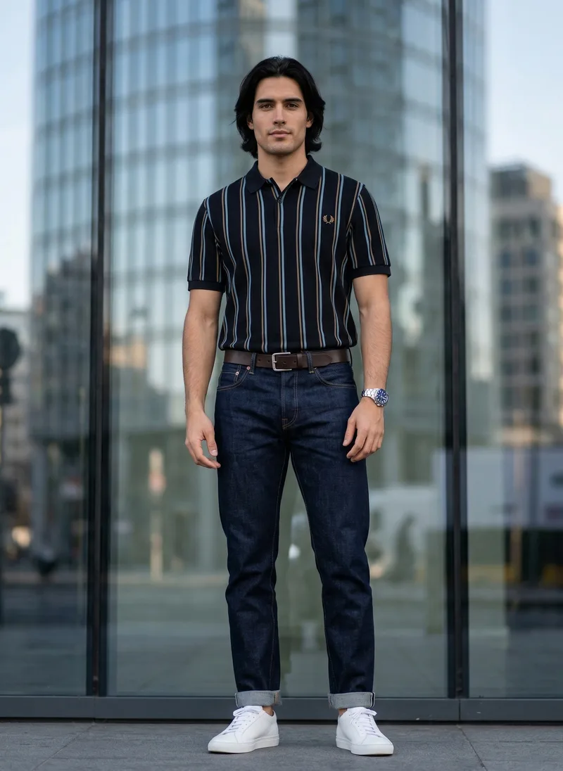 MODA AI catalog output from the Ayna comparison, a striped navy polo on one consistent male model