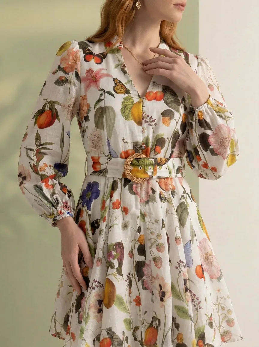 MODA AI output 3 of the 10-shot set on the floral dress — front, side, detail, and back angles held on one model